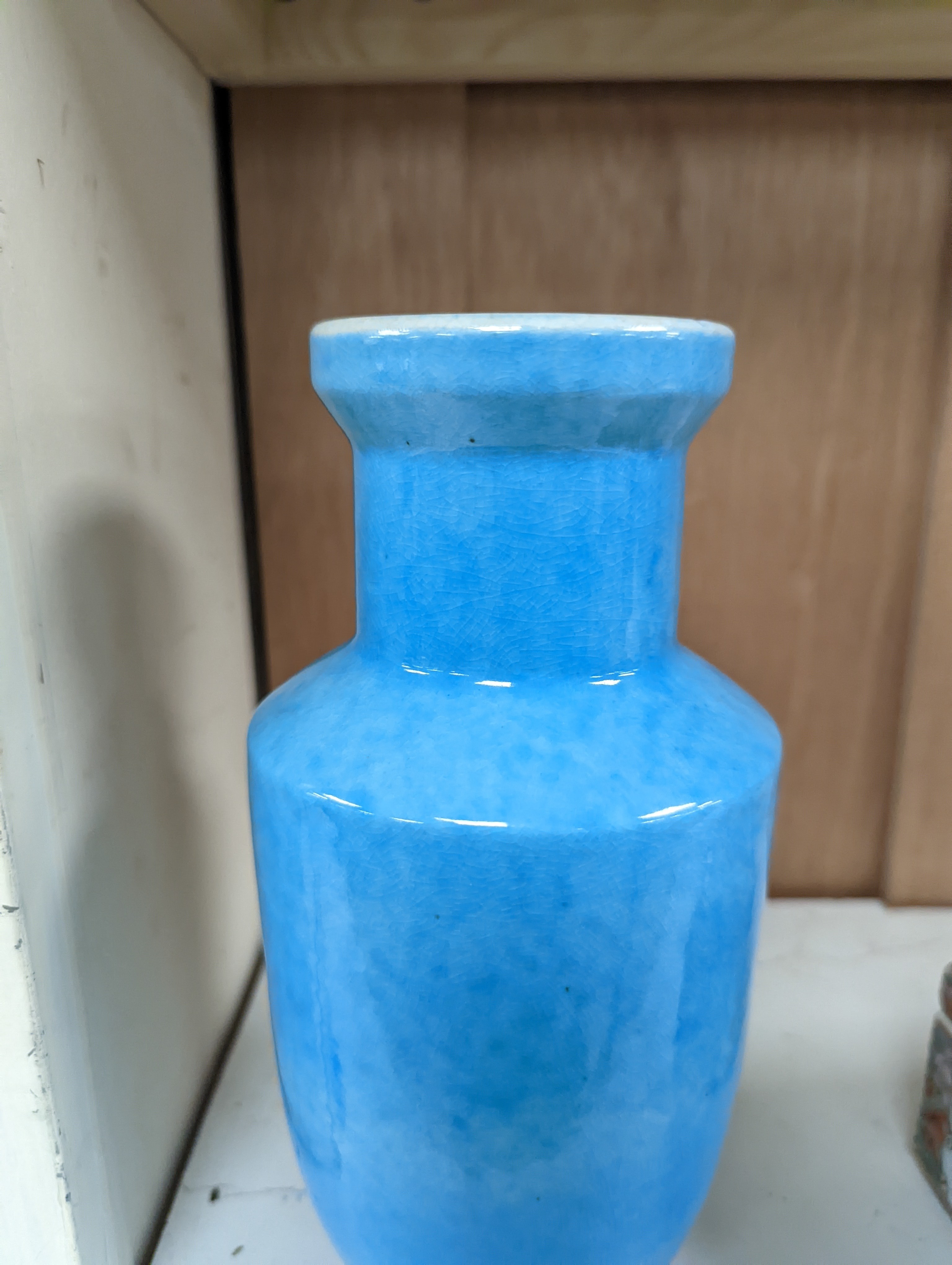 A Chinese turquoise glazed vase 22cm, with a fine crackle to the exterior glaze